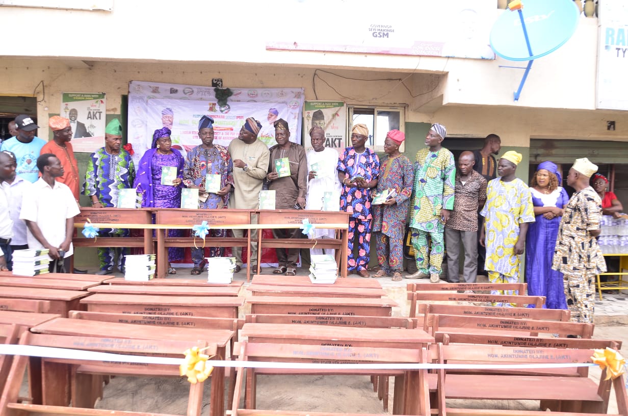 Oyo Lawmaker, AKT Distributes Desks, Tables, Exercise Books To Four Schools In Lagelu