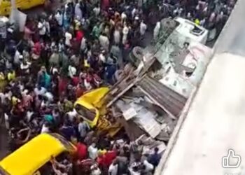 Truck Falls Off Bridge, Crashes Into Two Buses In Lagos